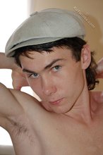Lithe young boy showing off his beautiful abs