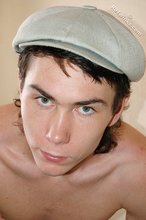 Lithe young boy showing off his beautiful abs