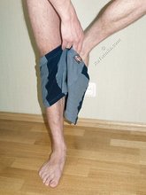 Hot dark-haired twink poses half-naked on the floor
