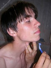 Dark-haired twink in an oversized sweater: HQ gay porn