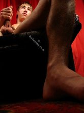 Shredded stud jerking his meaty cock on camera