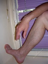 Twinky young boy showing his hairy cock up close