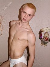 Blond-haired playful twink posing in his sexy socks