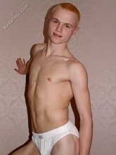 Blond-haired playful twink posing in his sexy socks