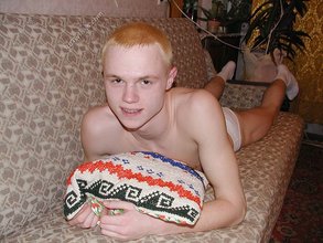 Blond-haired playful twink posing in his sexy socks
