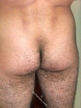 Slender young boy posing with his sexy legs spread