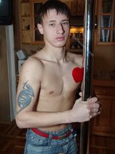 Tatted-up twink and his improvised stripper pole