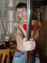 Tatted-up twink and his improvised stripper pole