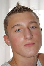 Tanned blue-eyed boy showing his beautiful body here