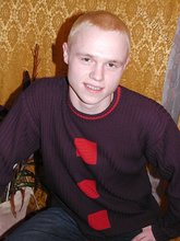 Blond-haired twink drinking and smelling flowers