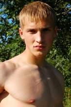 Blond-haired Russian twink shows his cock outdoors