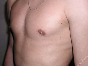 Effeminate young boy showing his thick dick up close