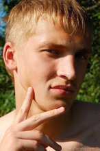 Shredded twink blonde showing his ass in the forest