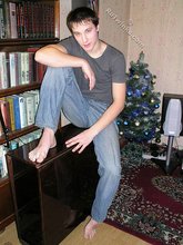 Young boy taking his shirt off and looking sexy