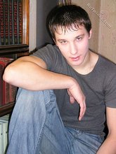 Young boy taking his shirt off and looking sexy