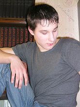 Young boy taking his shirt off and looking sexy