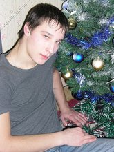 Young boy taking his shirt off and looking sexy
