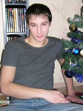 Young boy taking his shirt off and looking sexy