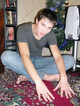 Young boy taking his shirt off and looking sexy
