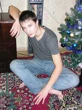 Young boy taking his shirt off and looking sexy