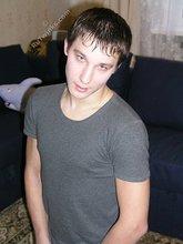 Young boy taking his shirt off and looking sexy