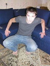 Young boy taking his shirt off and looking sexy
