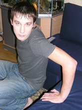 Young boy taking his shirt off and looking sexy