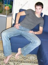 Young boy taking his shirt off and looking sexy