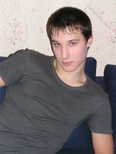 Young boy taking his shirt off and looking sexy