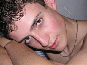 White socks horny-looking young boy shows his cock