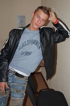 Tanned and sexy twink blonde posing seductively for you