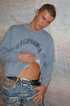 Tanned and sexy twink blonde posing seductively for you