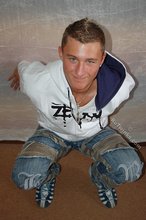 Tanned and sexy twink blonde posing seductively for you