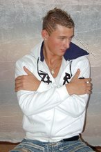 Tanned and sexy twink blonde posing seductively for you