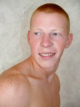 Redheaded twink showing his pretty a-hole up close