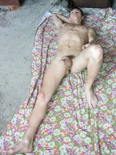 Blue-eyed beauty shows his cock while laying peacefully