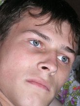 Blue-eyed beauty shows his cock while laying peacefully