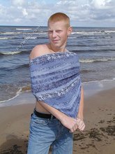 Redheaded guy posing shirtless in the woods