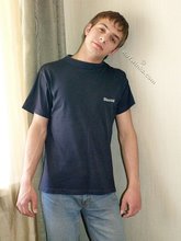 Dark-haired twink with a hot cock loves showing off