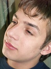 Dark-haired twink with a hot cock loves showing off