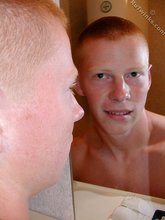 Redheaded dude eating his own jizz on camera