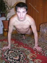 Dark-haired stud playfully fucking the carpet