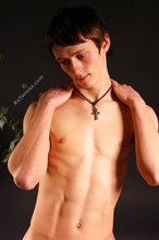 Perfect booty twink posing shamelessly on all fours