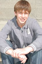 Playful twink posing outdoors and stripping indoors