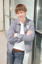 Playful twink posing outdoors and stripping indoors