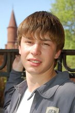 Playful twink posing outdoors and stripping indoors