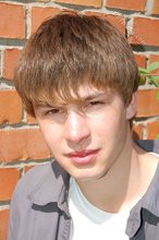 Playful twink posing outdoors and stripping indoors