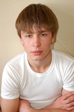 Playful twink posing outdoors and stripping indoors