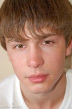Playful twink posing outdoors and stripping indoors