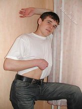Tatted-up twink shows off in front of a camera